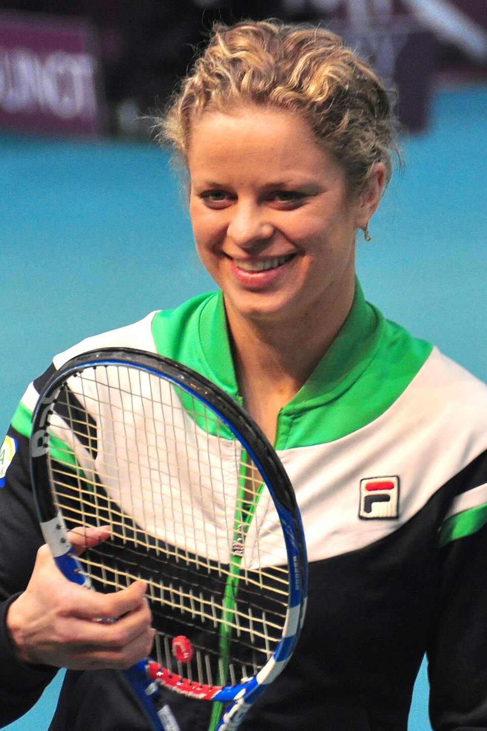 Kim Clijsters 在網球場上的比賽照片