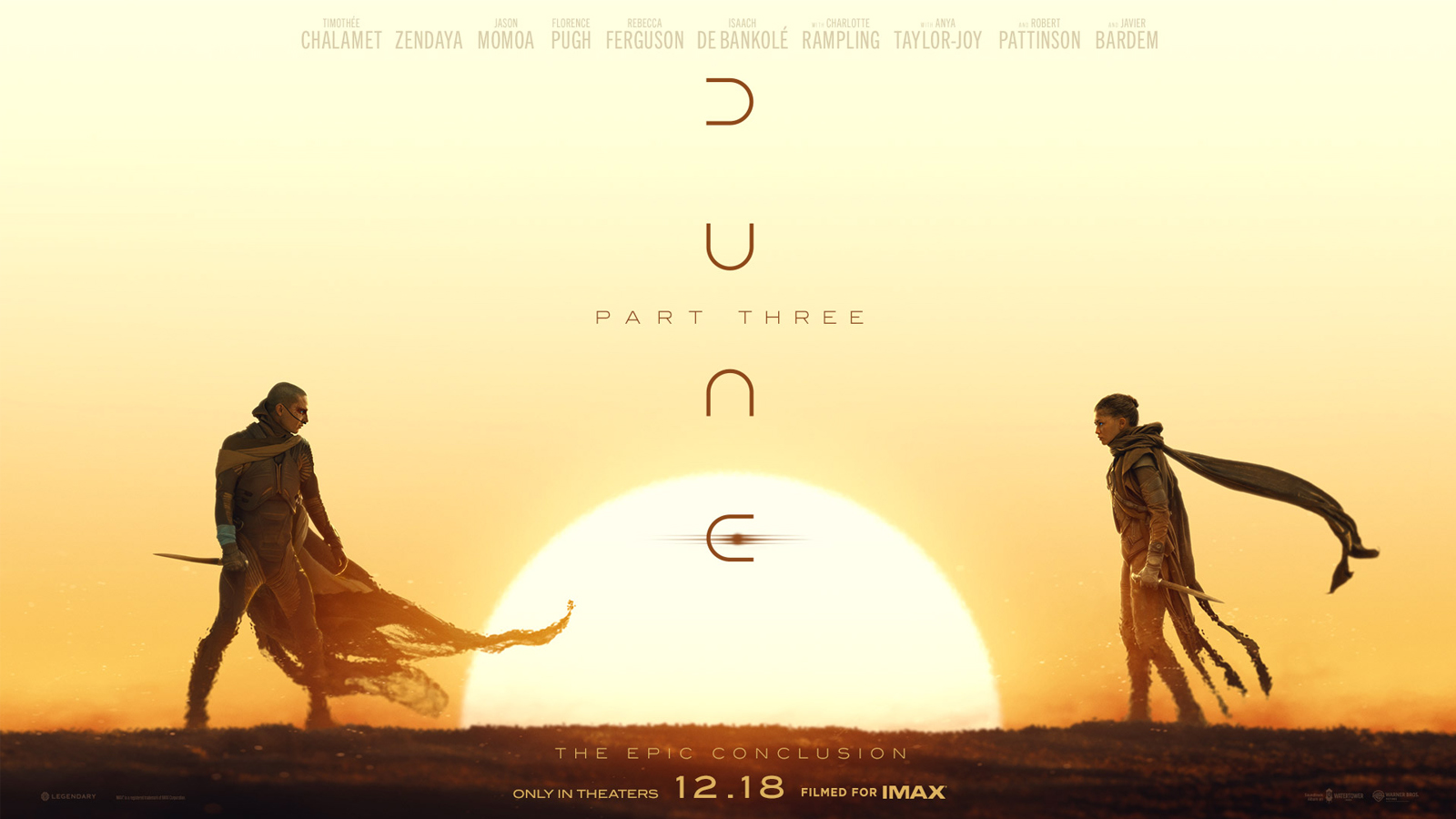 《Dune: Part Three》官方沙漠宣傳畫面,兩名角色站在落日下